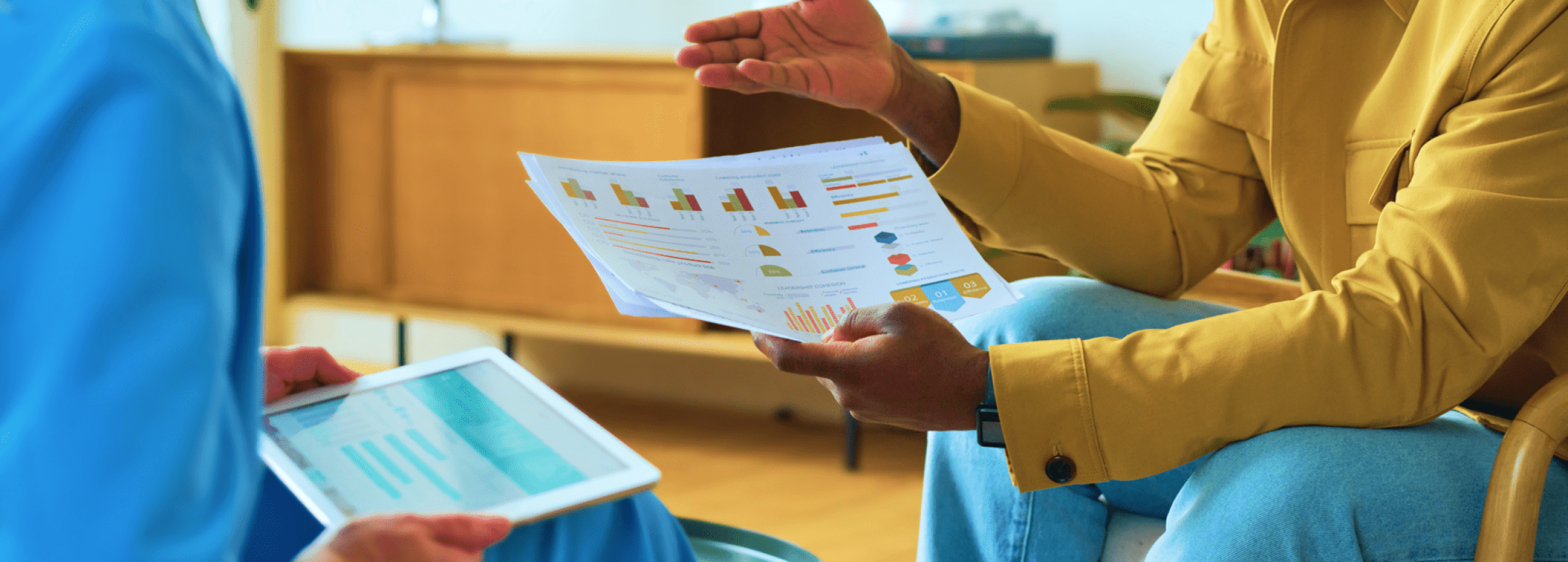 cropped-shot-of-young-black-man-explaining-graphic-2023-11-27-05-18-18-utc 1